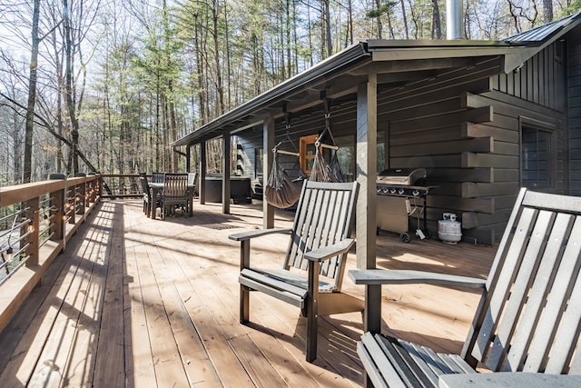 wooden terrace with grilling area