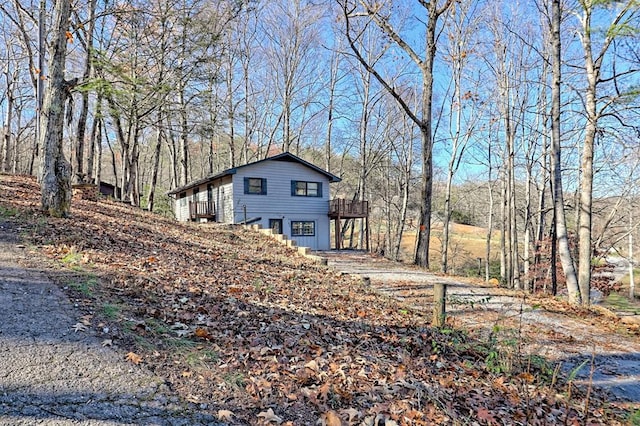 view of home's exterior featuring a deck