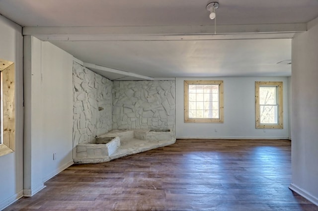 unfurnished room with hardwood / wood-style flooring