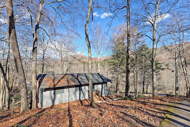 view of home's exterior featuring a mountain view