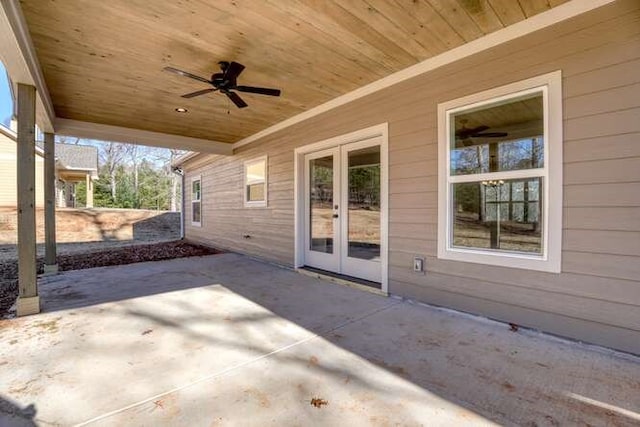 view of patio with ceiling fan and french doors