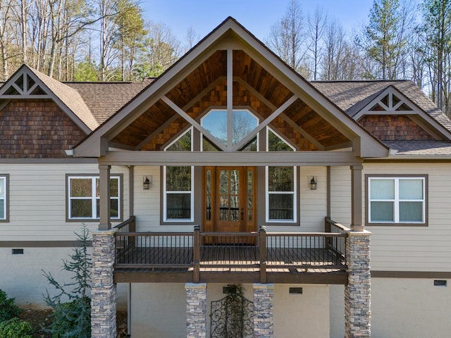 craftsman-style house with crawl space and a shingled roof