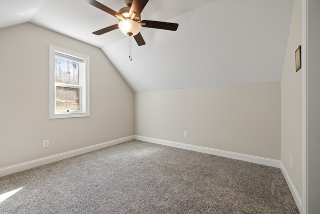 bonus room featuring ceiling fan, baseboards, lofted ceiling, and carpet floors