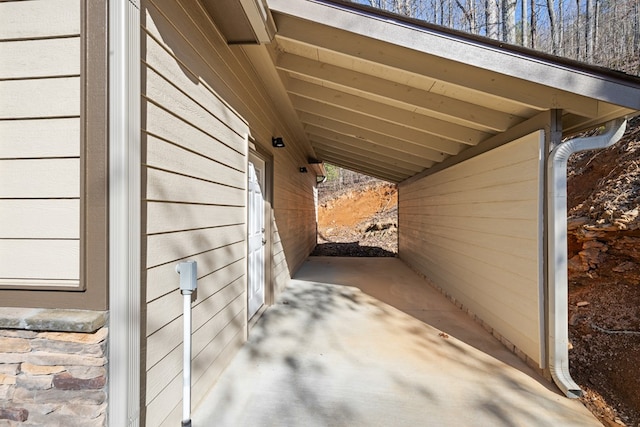 view of patio / terrace featuring a carport