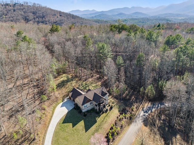 bird's eye view with a mountain view and a view of trees