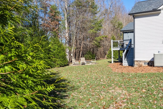 view of yard with central AC