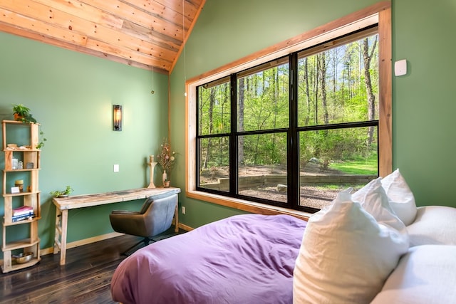 bedroom with baseboards, wooden ceiling, wood finished floors, and lofted ceiling