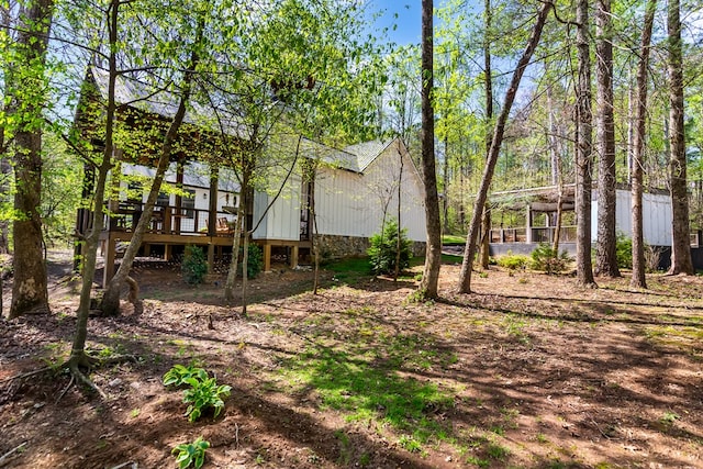 exterior space featuring a wooden deck
