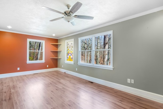 1575 Old Burnt Mountain Rd, Jasper, GA 30143 - spare room with a textured ceiling, wood finished floors, baseboards, built in shelves, and ceiling fan