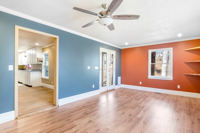 1575 Old Burnt Mountain Rd, Jasper, GA 30143 - unfurnished room featuring a ceiling fan, light wood finished floors, ornamental molding, recessed lighting, and baseboards