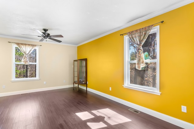 1575 Old Burnt Mountain Rd, Jasper, GA 30143 - spare room with ceiling fan, baseboards, dark wood-style floors, and ornamental molding