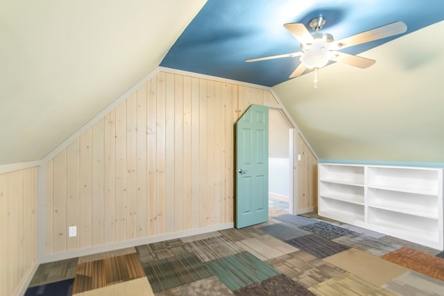 1575 Old Burnt Mountain Rd, Jasper, GA 30143 - bonus room with vaulted ceiling, a ceiling fan, baseboards, and wood walls