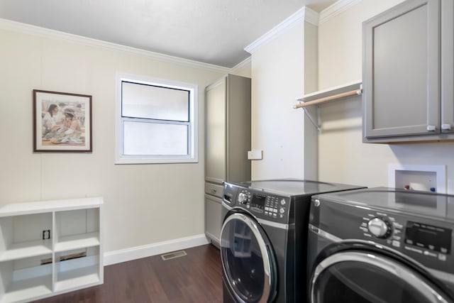 1575 Old Burnt Mountain Rd, Jasper, GA 30143 - laundry area with washer and clothes dryer, cabinet space, crown molding, dark wood finished floors, and baseboards