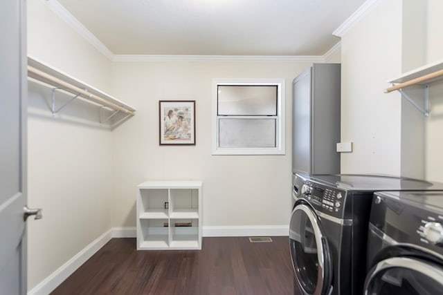 1575 Old Burnt Mountain Rd, Jasper, GA 30143 - laundry room featuring washing machine and clothes dryer, dark wood-type flooring, baseboards, and ornamental molding