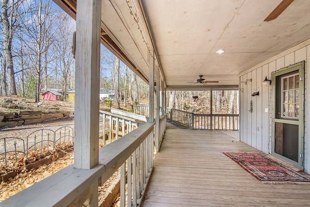 1575 Old Burnt Mountain Rd, Jasper, GA 30143 - wooden porch with a ceiling fan