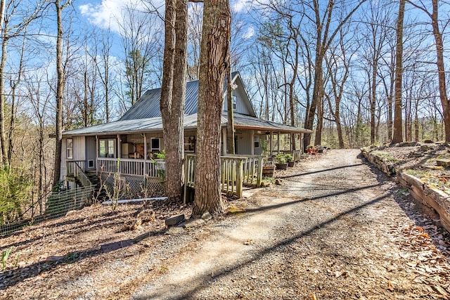 1575 Old Burnt Mountain Rd, Jasper, GA 30143 - view of front of home with covered porch, metal roof, and board and batten siding