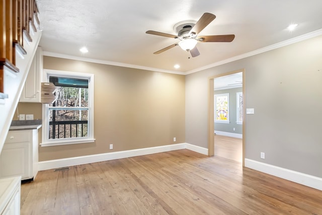 1575 Old Burnt Mountain Rd, Jasper, GA 30143 - unfurnished room with a ceiling fan, light wood-type flooring, baseboards, recessed lighting, and crown molding