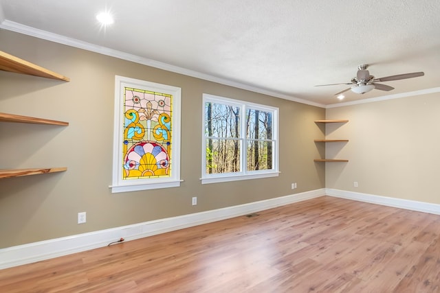 1575 Old Burnt Mountain Rd, Jasper, GA 30143 - unfurnished room featuring wood finished floors, crown molding, ceiling fan, baseboards, and a textured ceiling