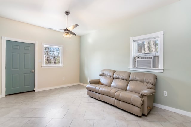 1575 Old Burnt Mountain Rd, Jasper, GA 30143 - living area featuring a ceiling fan, baseboards, and cooling unit