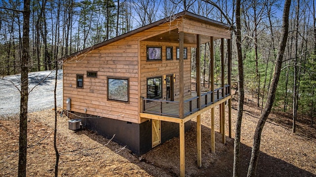 366 Three Oaks Dr, Morganton, GA 30559 - view of side of home featuring crawl space, a wooden deck, and central AC unit