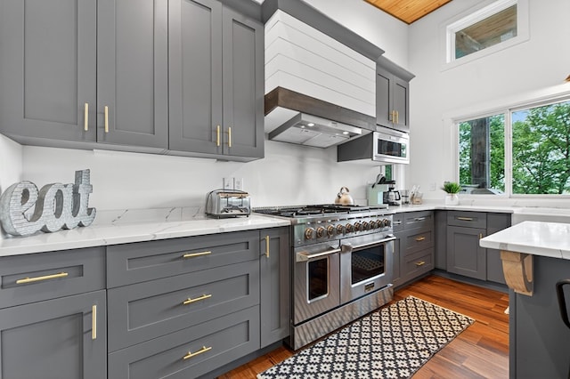 897 Faraday Dr, Ellijay, GA 30540 - kitchen featuring stainless steel appliances, gray cabinetry, light stone counters, and dark wood-type flooring
