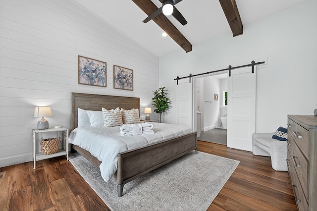 897 Faraday Dr, Ellijay, GA 30540 - bedroom featuring a barn door, dark wood finished floors, ensuite bath, ceiling fan, and wooden walls
