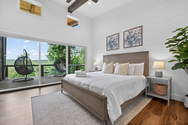 897 Faraday Dr, Ellijay, GA 30540 - bedroom featuring access to outside, a high ceiling, wood finished floors, wooden walls, and beamed ceiling