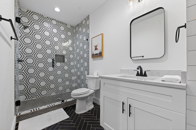 897 Faraday Dr, Ellijay, GA 30540 - full bathroom with a stall shower, vanity, an accent wall, and recessed lighting