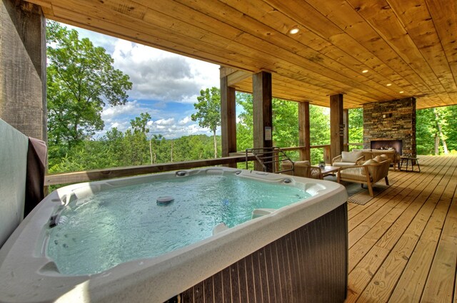 897 Faraday Dr, Ellijay, GA 30540 - wooden terrace with an outdoor living space with a fireplace and a hot tub