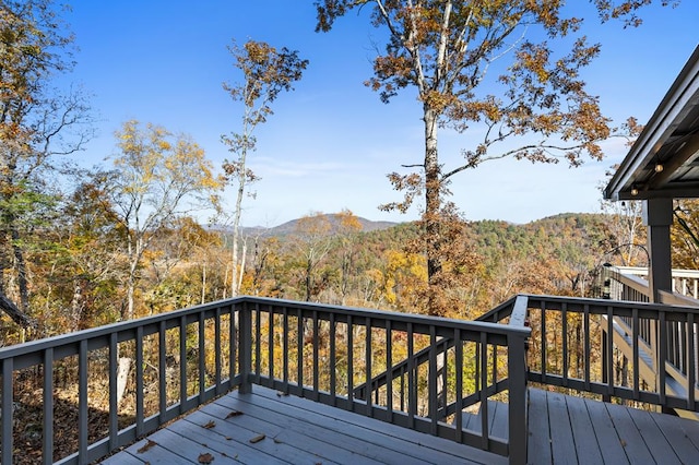 wooden terrace with a mountain view