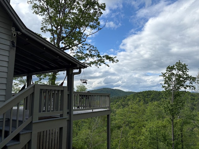 view of yard with a wooded view