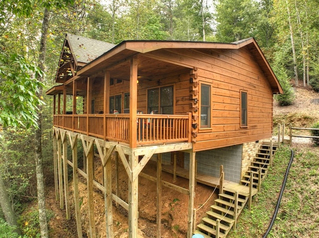 view of side of home featuring a deck