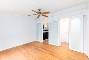 unfurnished bedroom featuring light wood-style floors