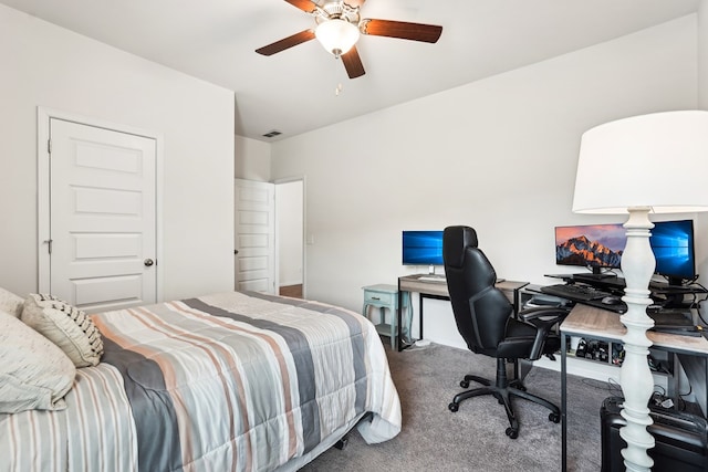 bedroom with carpet floors, a ceiling fan, baseboards, and visible vents