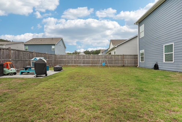 view of yard featuring a fenced backyard and a patio area