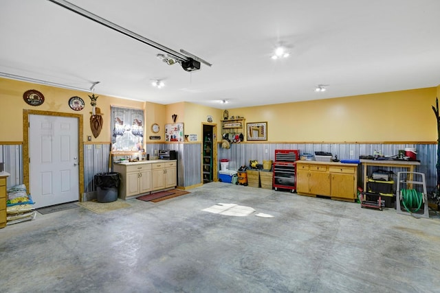 garage featuring a garage door opener