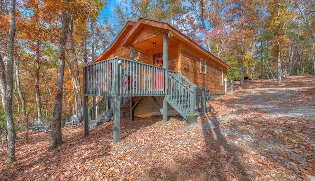 exterior space featuring a wooden deck