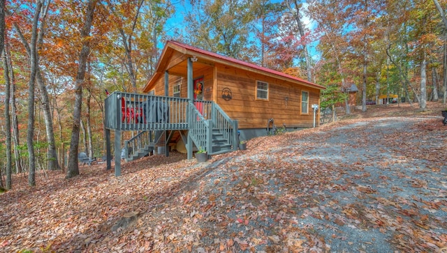 view of front of home with a wooden deck