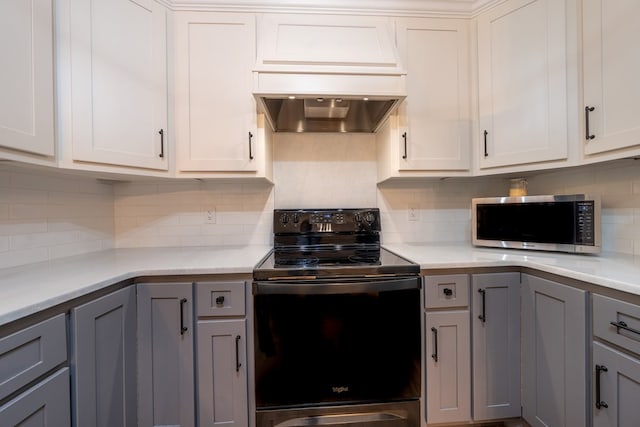 365 Quarles Ln, Ellijay, GA 30540 - kitchen featuring stainless steel microwave, electric range oven, custom exhaust hood, and gray cabinetry