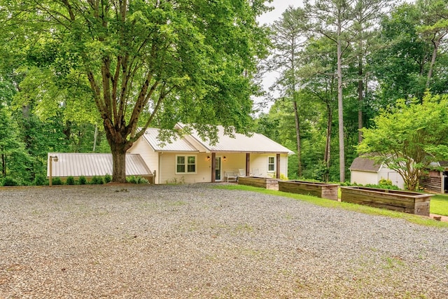 365 Quarles Ln, Ellijay, GA 30540 - single story home with driveway, a metal roof, and an outdoor structure