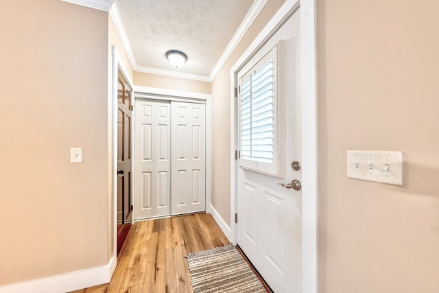 365 Quarles Ln, Ellijay, GA 30540 - doorway to outside with a textured ceiling, light wood-type flooring, and crown molding