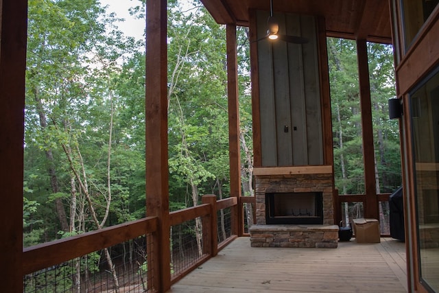 exterior space featuring a stone fireplace