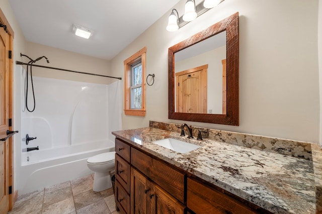 bathroom with toilet, bathtub / shower combination, and vanity