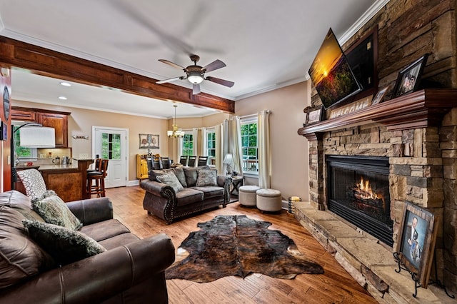 615 Navaho Way, Ellijay, GA 30540 - living area with a fireplace, ornamental molding, ceiling fan, light wood-style flooring, and beamed ceiling