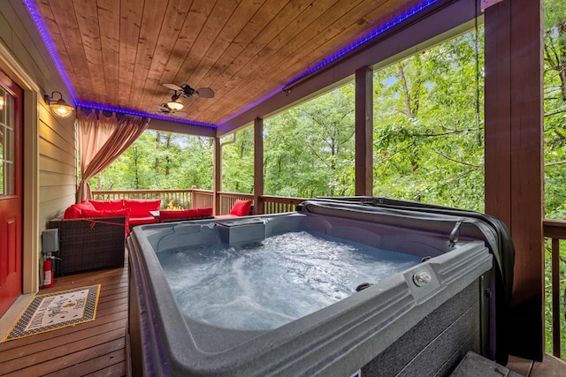 615 Navaho Way, Ellijay, GA 30540 - wooden terrace featuring a hot tub, ceiling fan, and an outdoor hangout area