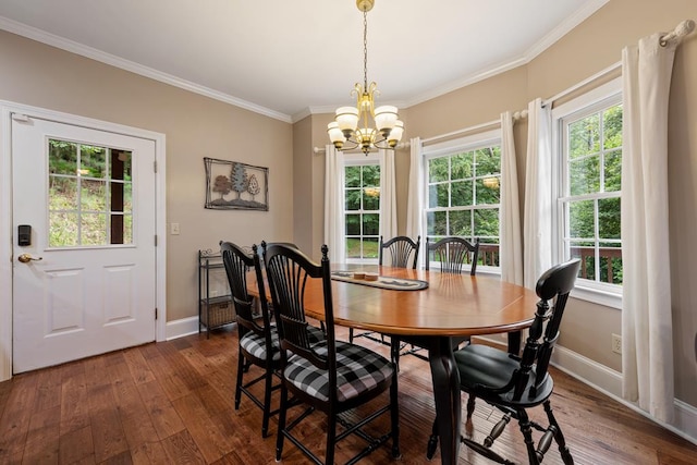 615 Navaho Way, Ellijay, GA 30540 - dining area with a chandelier, crown molding, dark wood finished floors, and baseboards