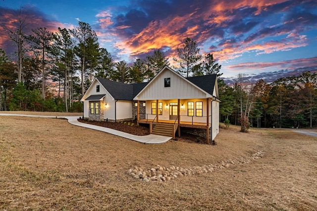 view of front of home featuring covered porch