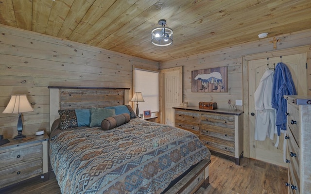 bedroom with wooden ceiling, wooden walls, and wood finished floors