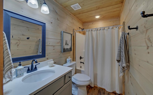 full bath with visible vents, toilet, wood ceiling, vanity, and wood walls