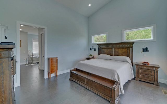 433 Hawkeye Trl, Marble, NC 28905 - bedroom with multiple windows, high vaulted ceiling, and baseboards